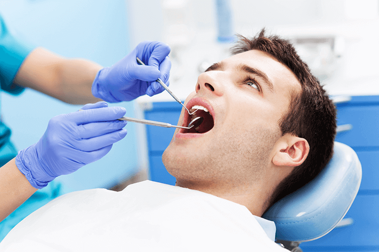 man at dentist
