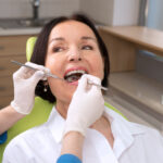 Middle-aged woman gets a dental cleaning and in jonesboro