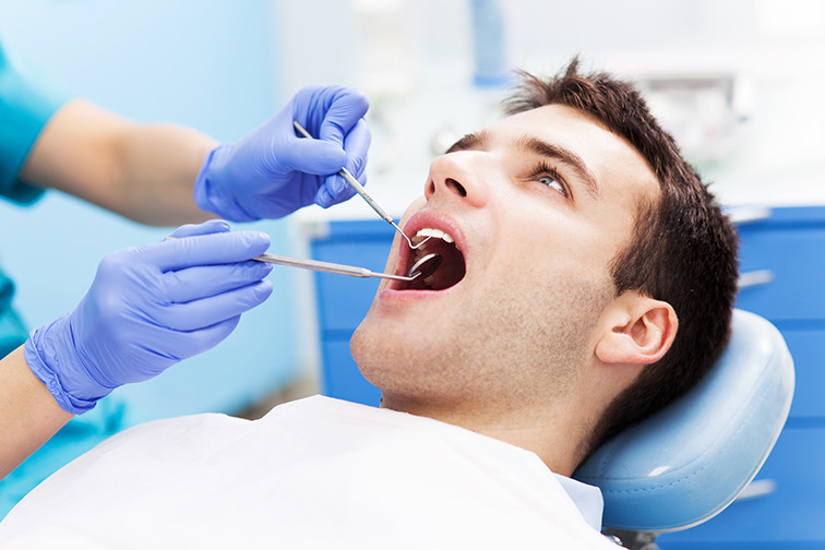 man at the dentist